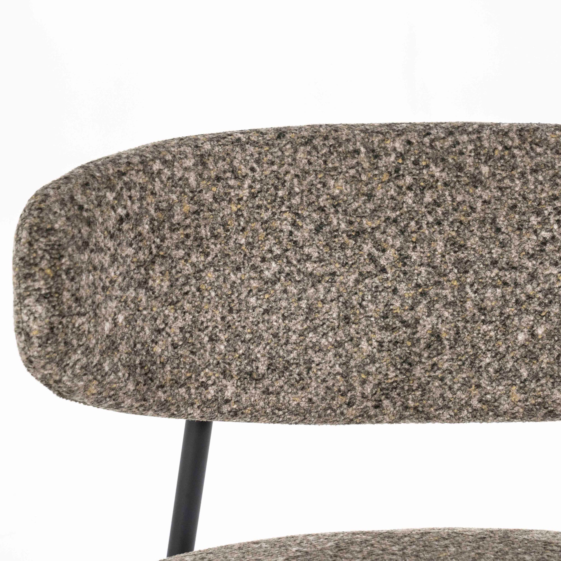 Lenestol i grønn melert stoff og svarte metallben