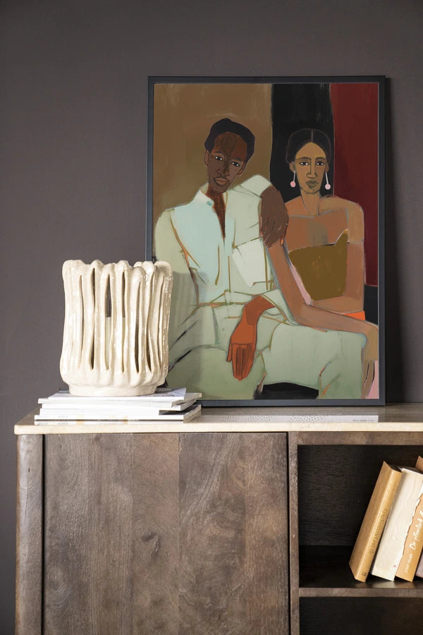 Maleri med mann og dame sittende tett sammen. Kunsttrykk på syrefritt papir, lerret og glass. 